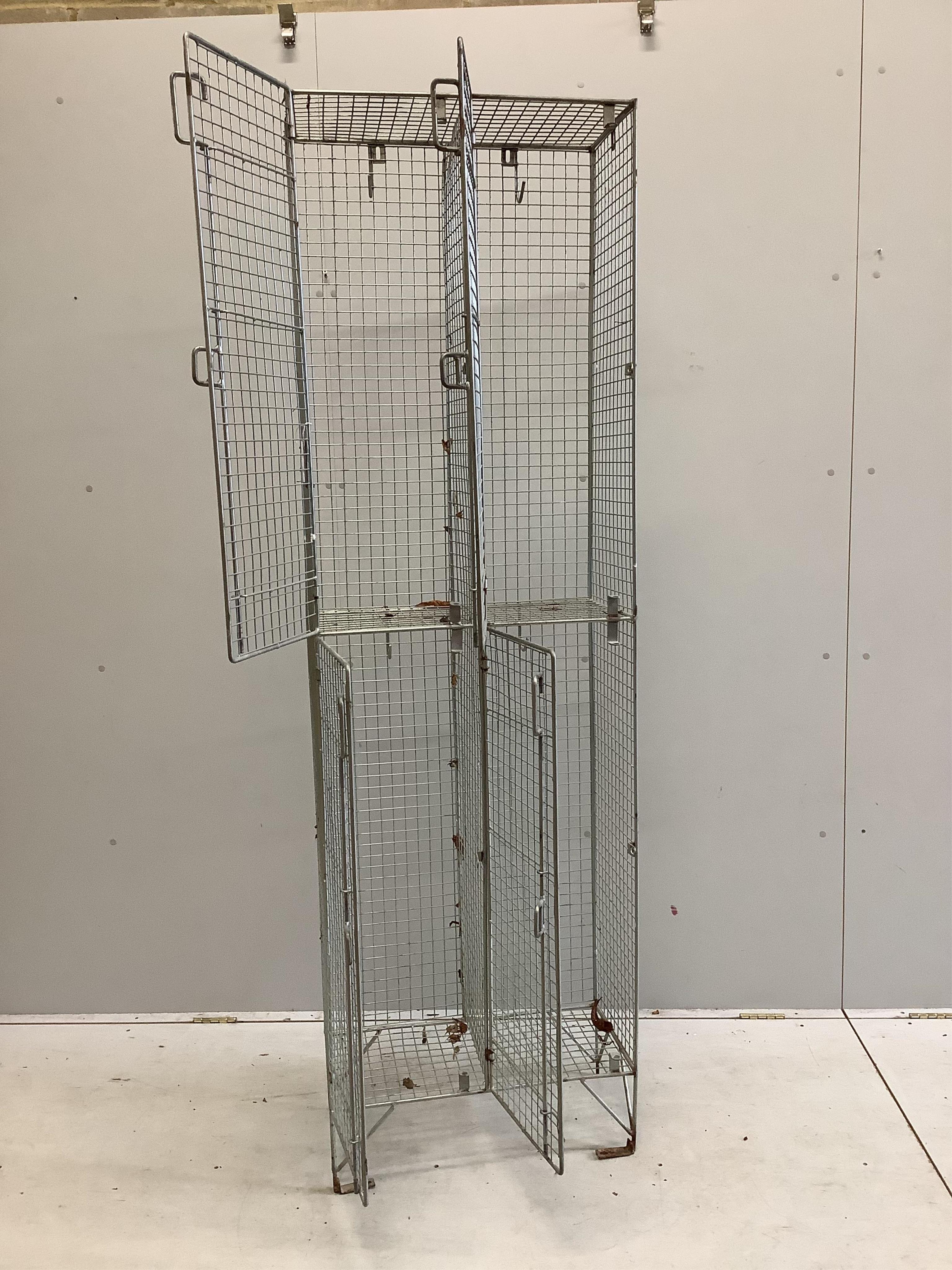 A wire work locker, width 60cm, depth 31cm, height 197cm. Condition - fair